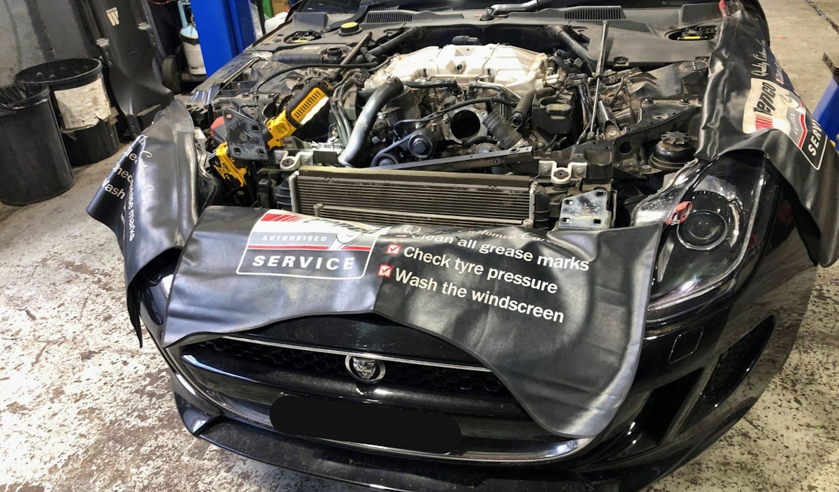 Replacing the water pump & oil cooler for a Jaguar F type - Prestige Auto Hub